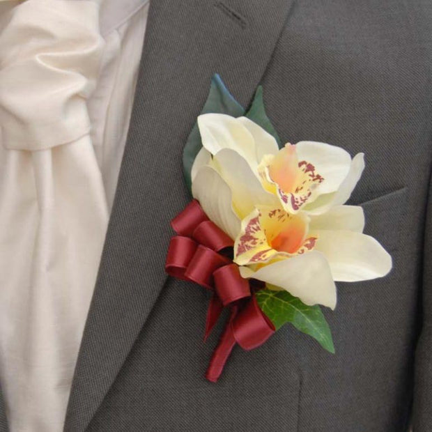 Grooms Double Silk Ivory Orchid Buttonhole with Burgundy Bow